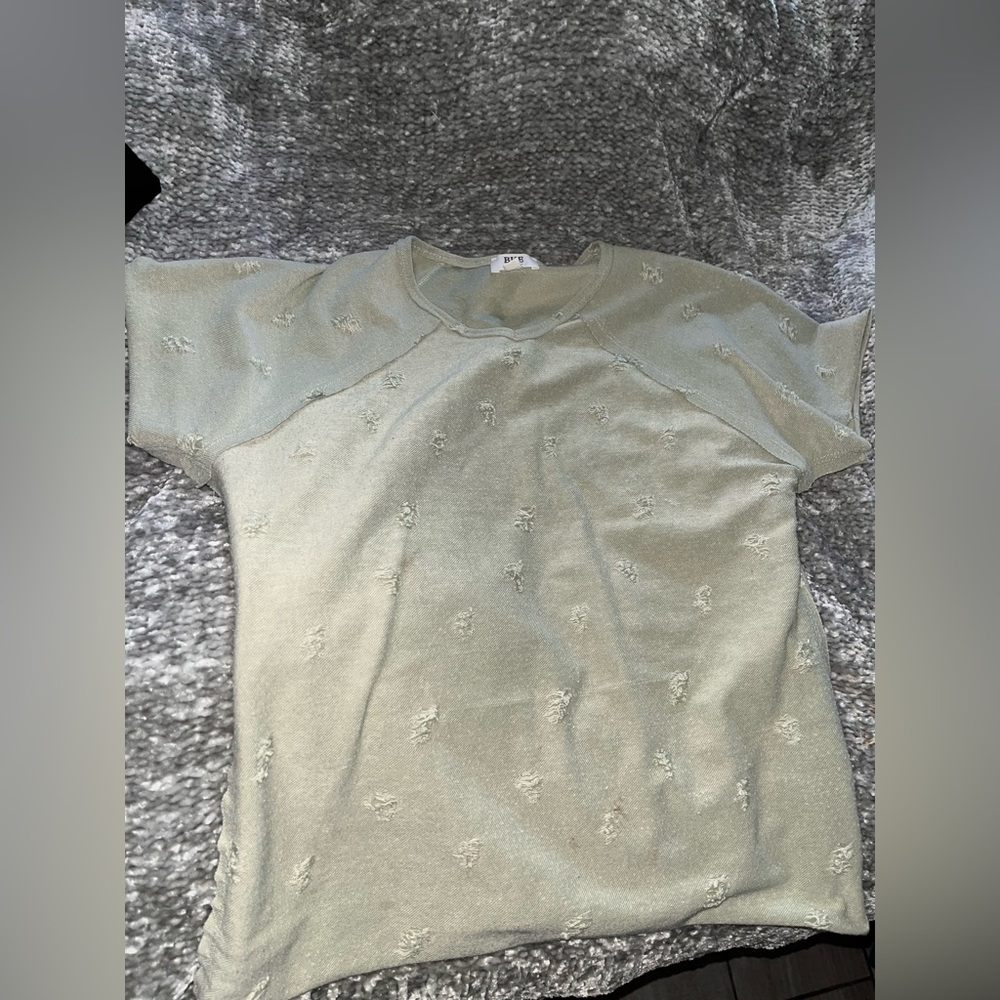 Buckle kids tee. Fits an L in adult
